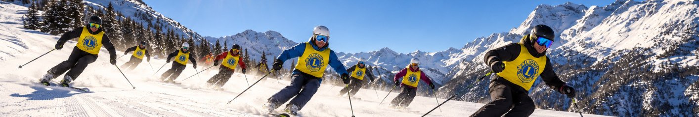 Sciatori Lions in discesa con le pettorine gialle